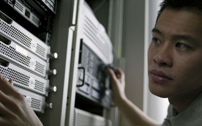 Computer Technician --- Image by © Royalty-Free/Corbis